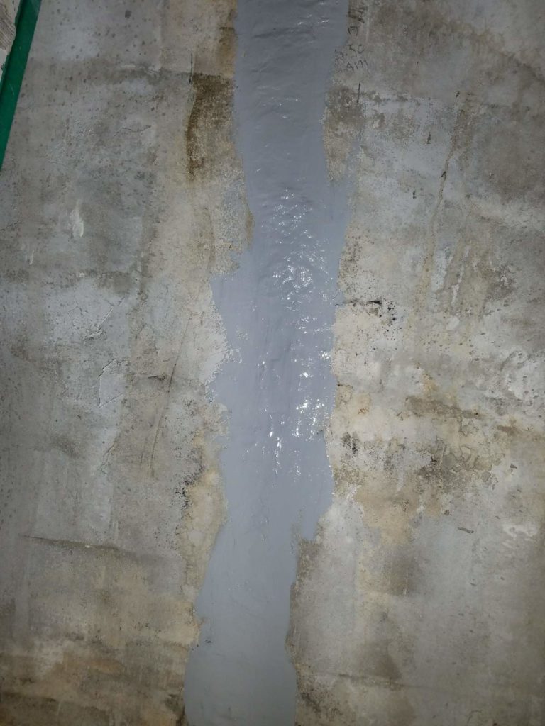 Finished Epoxy Repair in Cracked Concrete Retaining Wall 4